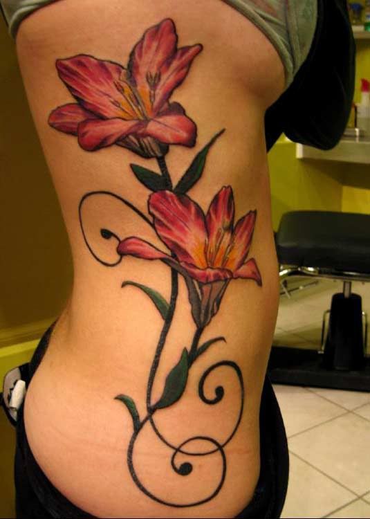 girls tattoos on hip. flower side tattoo Pictures,