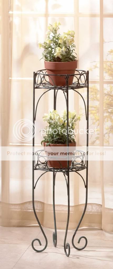   shelf plant stand. A graceful addition for indoors or out; shelves