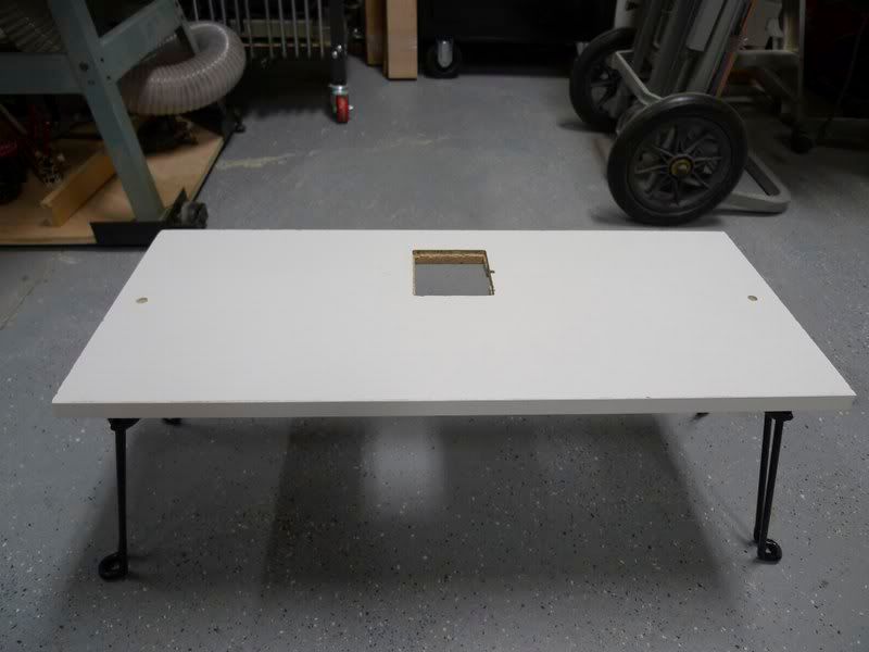 It is a simple scrap piece of melamine that was made for a one time use, but it worked so well I kept it and added some legs. It is a simple scrap piece of melamine that was made for a one time use, but it worked so well I kept it and added some legs.